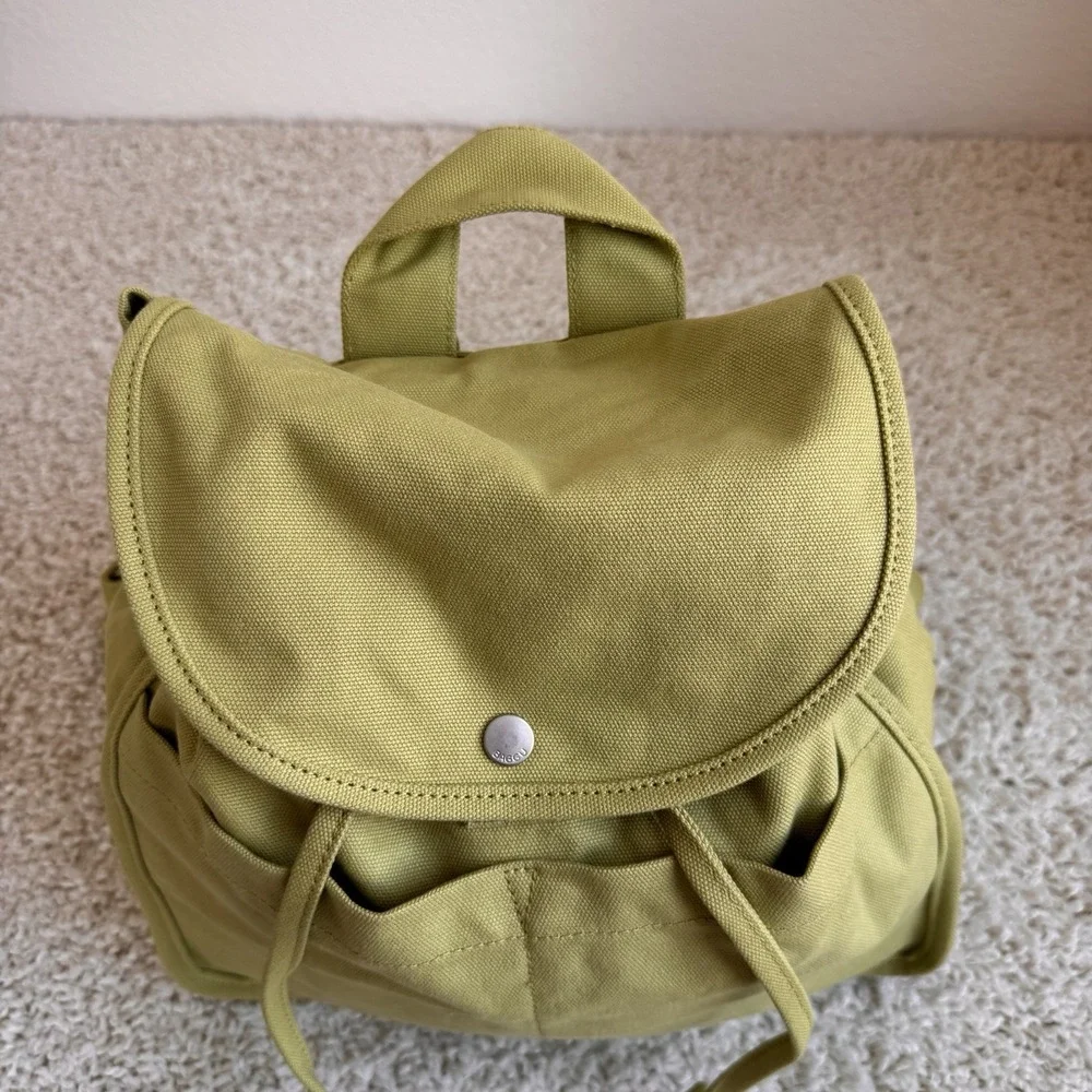 BAGGU Green Canvas Drawstring Backpack Rucksack Flap Snap Adjustable Straps